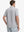 Back view from waist up showing the fit of LIGHT GREY 4 Way Stretch Jacquard Polo on model