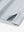 Close-up detail of hem opening on Modern Texture Stylish Polo in LIGHT GREY.