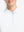 Front shot from nose to chest of model wearing white women's 5 buttons collared polo shirts
