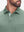 Front view from nose to chest in celadon green heather of performance heather contrast collar polo shirts.