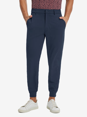Model wearing Lightweight Ankle-Zip Sweatpants with 4 Pockets in navy, lower body front view