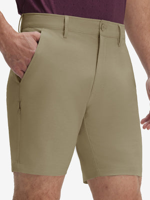 Front lower body shot of model wearing khaki flat front hybrid golf shorts