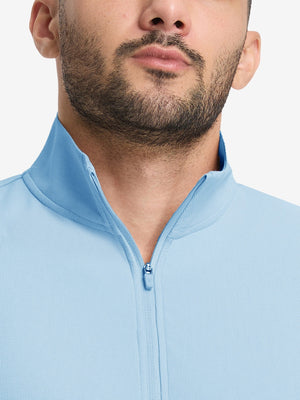 Front view from nose to chest of model wearing light blue waffle texture 1/4 zip pullover