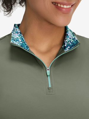 Front view from nose to chest of model wearing mossy stone women's athletic quarter zip tank tops