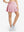 Front lower body shot of model wearing lavender women's high waisted golf skirts with 4 inner pockets