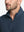 Front view from nose to chest of model wearing navy waffle texture 1/4 zip pullover