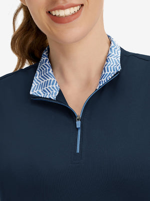 Front view from nose to chest of model wearing navy women's athletic quarter zip tank tops