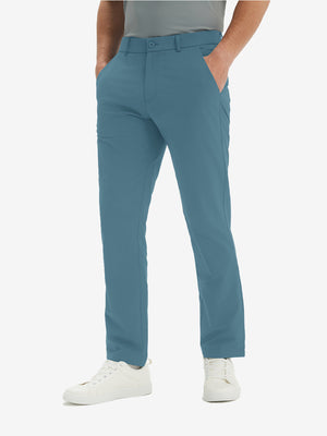 Front lower-body view of model in blue stretch quick dry casual golf pants with 4 pockets