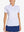 Front view from nose to hem of model wearing WHITE Women's Performance Solid Polo with skirt