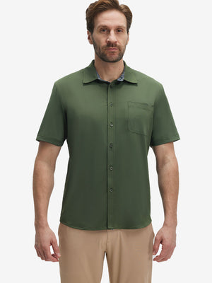 Front upper body shot of model wearing military green cool print plain button up shirts