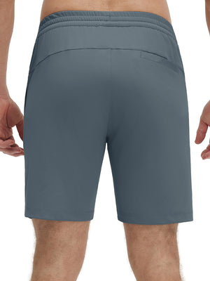 Back lower body shot of model wearing grey blue 4 way stretch breathable workout athletic shorts