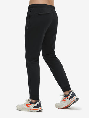 Back view of black superion softness mesh joggers with zipper pockets