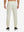 Back lower body view showing beige soft sweatpants with 4 zipper pockets