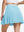 Back lower body shot of model wearing lake green women's moisture-wicking athletic tennis skirts