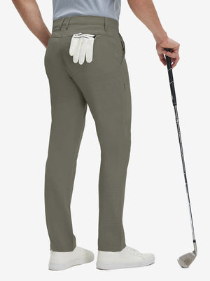 Back lower body shot of model wearing tea brown straight fit lightweight dress golf pants