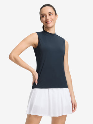 Front upper body shot of model wearing navy blue women's moisture-wicking mock neck sleeveless golf tops