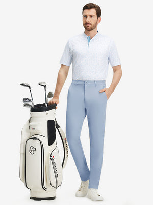 Front full body shot of model wearing sky blue stretch cotton blend slim fit golf trousers 5 pockets