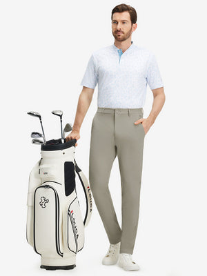 Front full body shot of model wearing khaki grey stretch cotton blend slim fit golf trousers 5 pockets