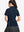 Back upper body shot of model wearing navy women's breathable 1/4 zip pullover golf shirts