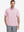 Model half-body front view wearing pink cotton blend plain shirt.