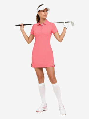 Front full body with golf club in lavender of women's lightweight golf dress with 2 pockets.