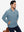 Model with both hands in pockets, wearing soft winter fleece jackets in misty blue, warm and relaxed.