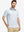 Front upper body shot of model wearing grey irregular shape premium ribbed collar print polo shirts