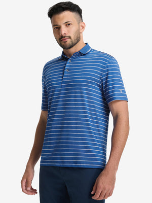 Front upper body shot of model wearing classic blue/airy blue non-curl ribbed collar striped polo shirts