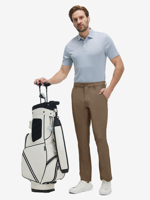 Front full body shot of model wearing tobacco brown straight fit lightweight dress golf pants