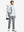 Full body model carrying golf bag in Water-resistant fleece lined pants, clean grey look