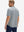 Back upper body shot of model wearing grey cool print plain button up shirts