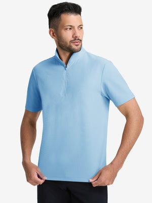 Front upper body shot of model wearing light blue waffle texture 1/4 zip pullover
