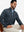 Model seated on chair, wearing full print quarter zip pullover in ocean yacht, casual upper body view.