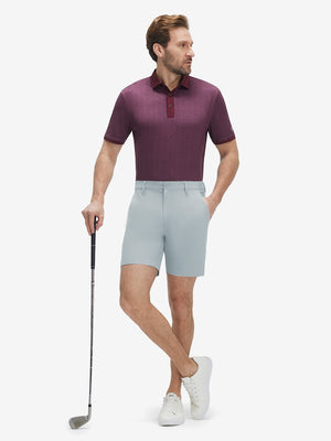 Front full body shot of model wearing newport blue flat front hybrid golf shorts