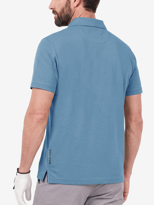 Back upper body shot of model wearing light blue  ultra-comfort slim fit roma knit polo shirts

