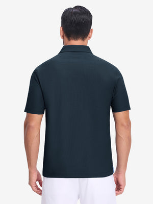 Back upper body shot of model wearing navy dry fit waffle textured collared golf shirts