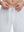 Detail view of elastic waistband on white 4 way stretch breathable workout athletic shorts