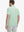Back view of model in Fruit Green Navy Stripe Performance Stripe Golf Shirt