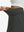 Detail view of elastic waistband on dark grey women's stretch a-line golf skort with 7 pockets