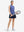 Front full body shot of model exercising in light blue navy women's q-zip pin striped texture golf shirts