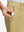 Detail view of front pocket on khaki flat front flex cotton blend golf shorts