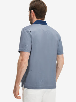 Back upper body shot of model wearing dark blue diamond premium ribbed collar print polo shirts