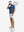 Front full body shot of model exercising in navy peony/arctic white non-curl ribbed collar striped polo shirts