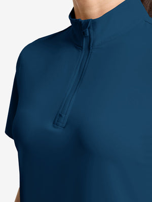 Detail view of neck zipper on blue women's breathable 1/4 zip pullover golf shirts