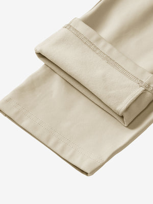 Boys Stretch Fleece Lined Casual Golf Pants in light khaki, flat lay showing fleece lining