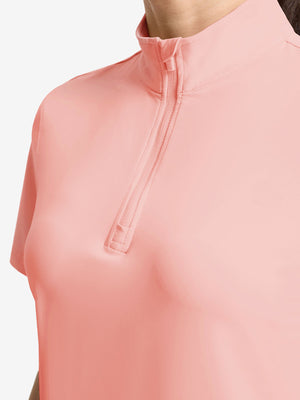 Detail view of neck zipper on coral powder women's breathable 1/4 zip pullover golf shirts