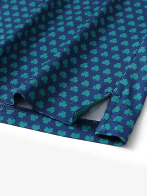 Hem slit detail of MAELREG Performance Jersey Print Polo in Four Leaf Clover – comfort & movement