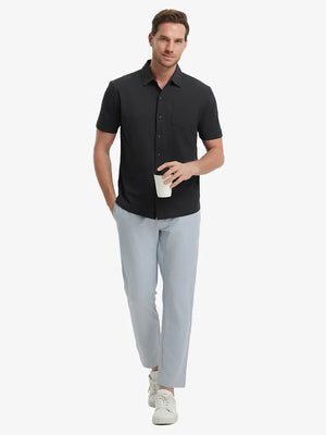 Full-body view of model holding takeaway drink cup in BLACK Cotton Blend Plain Shirt.