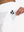 Detail view of back pocket on white women's stretch a-line golf skort with 7 pockets