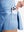 Detail view of inner pocket on light blue women's high waisted golf skirts with 4 inner pockets